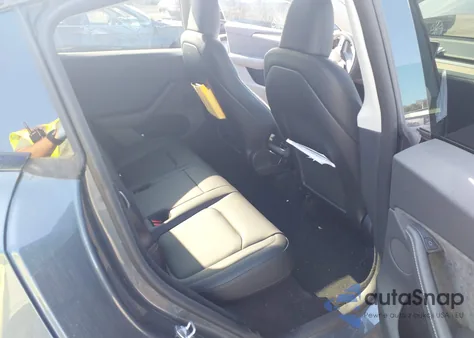 2023 Tesla Model Y from USA, damaged, VIN 7SAYGDEE1PA119472